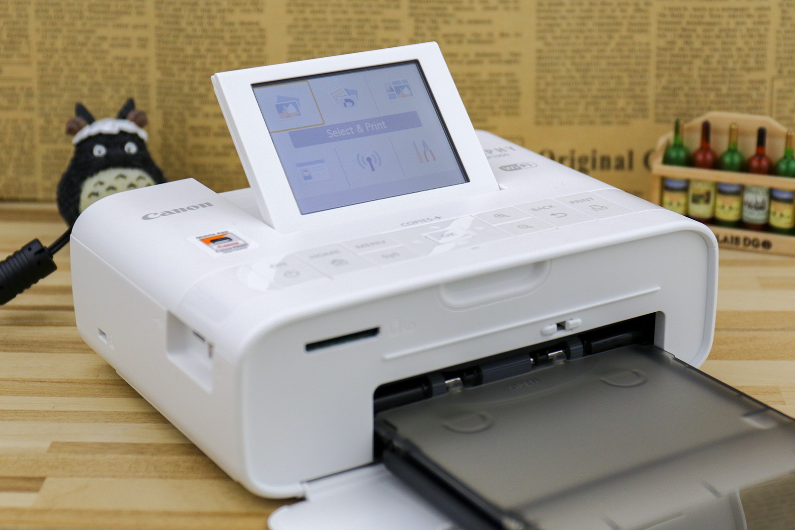 佳能炫飞打印机好用不照片褪色吗